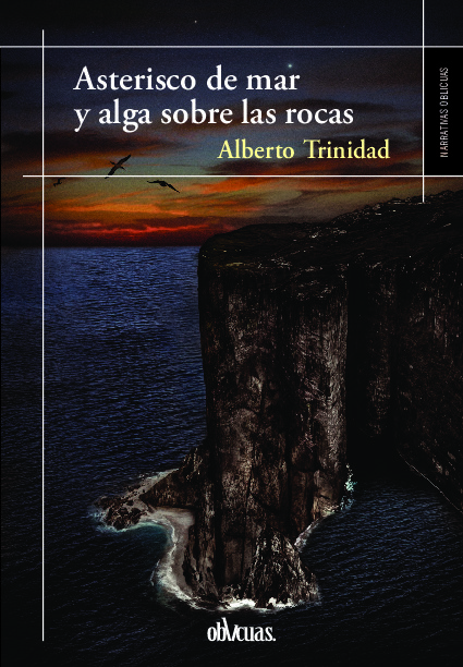 ASTERISCO DE MAR Y ALGA SOBRE LAS ROCAS